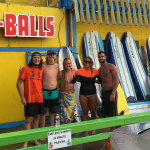 Endless summer surf instructors posing for photo